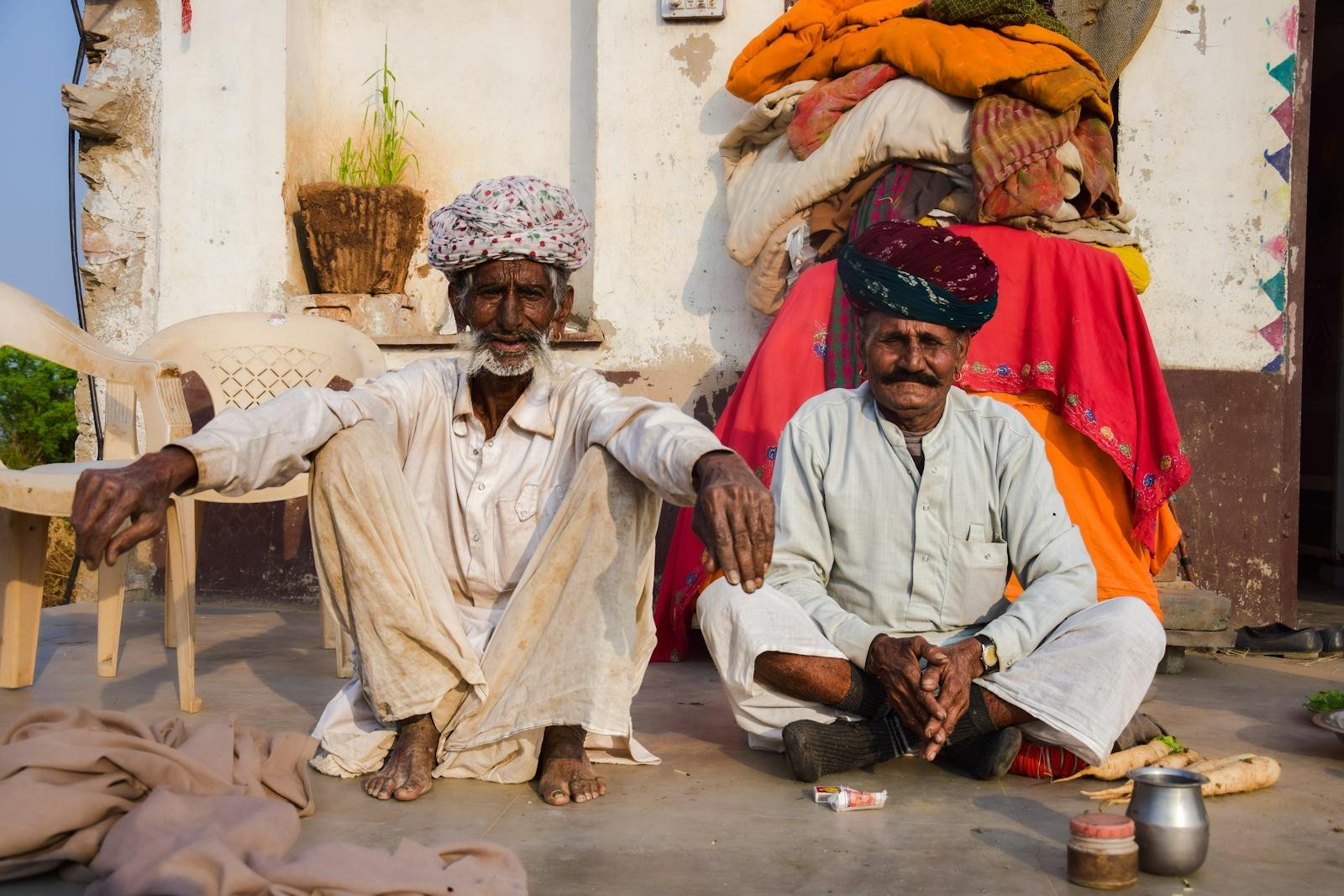 Two men sitting on the ground